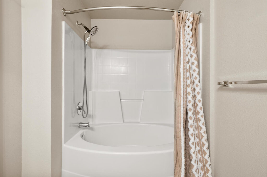 Standing shower and tub with curtain