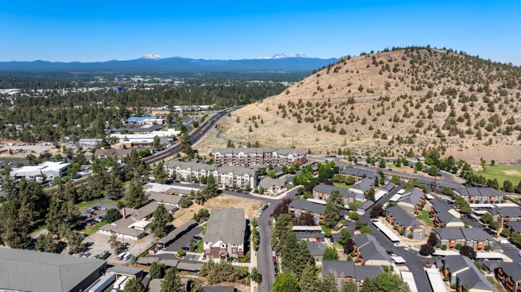 Exterior view of apartment complex and other apartment buildings nearby