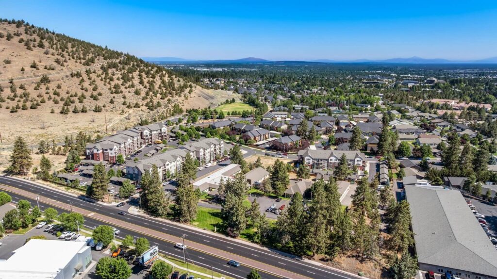 Exterior view of apartment complex and other apartment buildings nearby